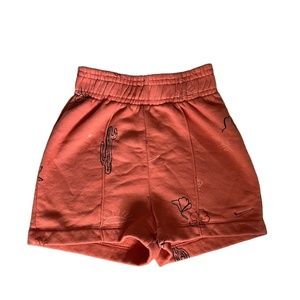 orange dessert nike high rise shorts